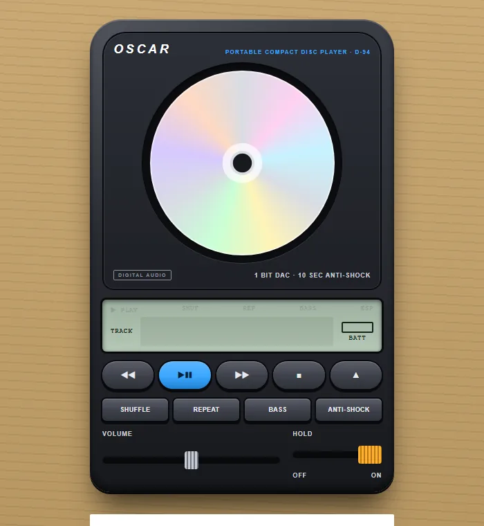 Portable CD Player, 1994 template: a dark rounded slab with a disc under a window, a grey-green display and a blue play key.
